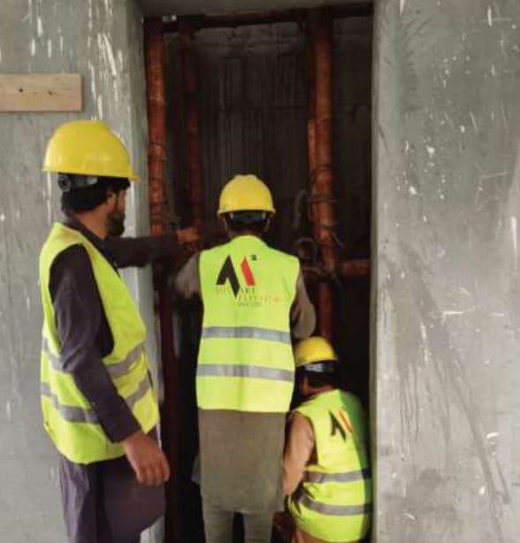 MSquare installation crew working in an elevator shaft